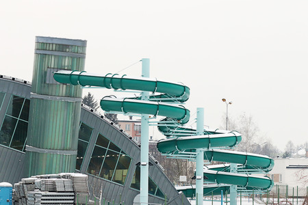 The exterior of the modern building is an indoor swimming pool with a slide for wintering. Rest for...