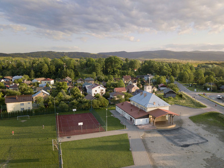 Poland. Panorama of the town from a birds eye view. Panoramic picture from quadrocopter or drone. Location of the porter brigade and sports facilities in the open air. Modern layout of the villageの写真素材