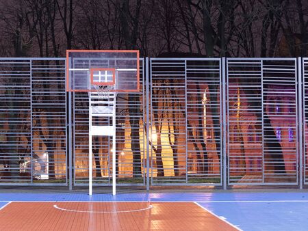 A new modern ball-free area in the lights of the night city. Evening sports in Lviv in Ukraine....