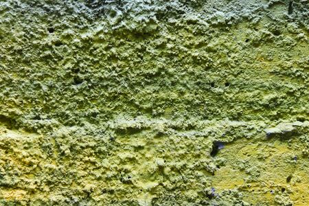 Abstract color painting on concrete block background blue,green,yellow.の写真素材