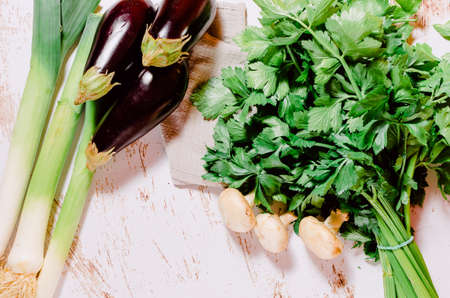 Close-up of a still life with leeks, mushrooms and eggplantの写真素材