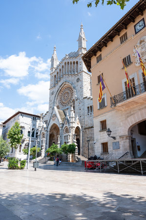 Soller, Spain - June, 19, 2021: Main square of Soller with the village church in the backgroundのeditorial素材