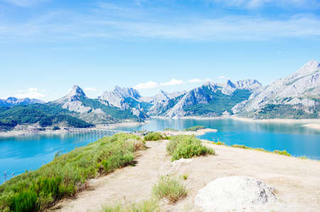 Landscape of Riano, a village with the Picos de Europa mountains in the backgroundの写真素材