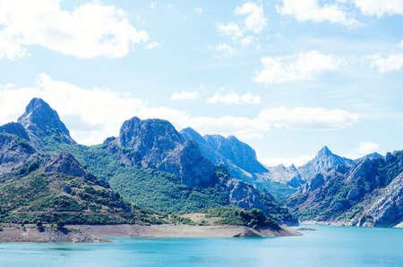 Landscape of Riano, a village with the Picos de Europa mountains in the backgroundの写真素材