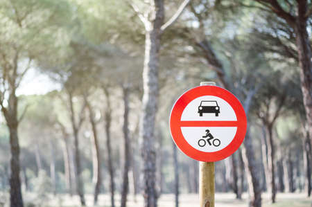 Entry of motor vehicles is prohibited. Traffic sign. Concept of ecologism