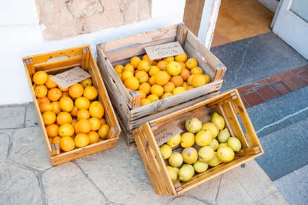 Three wooden crates full of oranges from soller in Majorca Spainの写真素材