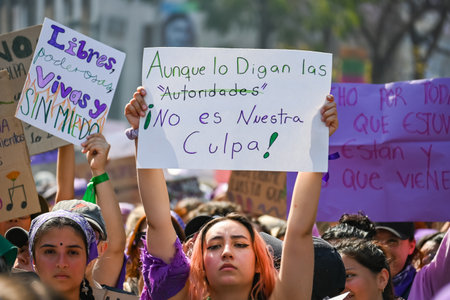 CuauhtÃ©moc, CDMX, Mexico - 03 08 2024: feminist march against woman violence for international women's day in Mexico Cityのeditorial素材