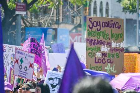 CuauhtÃ©moc, CDMX, Mexico - 03 08 2024: feminist march against woman violence for international women's day in Mexico Cityのeditorial素材