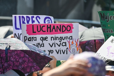CuauhtÃ©moc, CDMX, Mexico - 03 08 2024: feminist march against woman violence for international women's day in Mexico Cityのeditorial素材