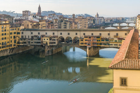 Arno river with the Ponte Vecchio bridge in Florence, Italyの写真素材