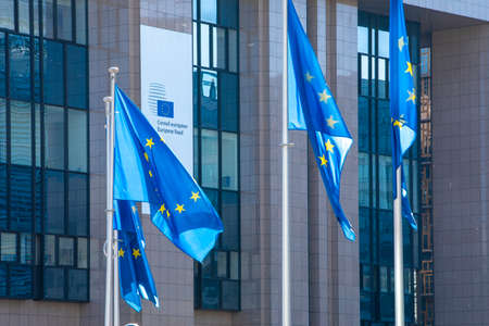 BRUSSELS, Belgium - fourth of may 2020: European Council. European flags floating in front of the European Council, Brussels, Belgiumのeditorial素材