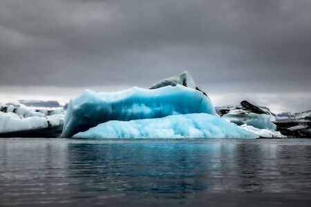 Several glaciers floating in the Jökulsárlón, a glacier lagoon in the south-east of Iceland. They...