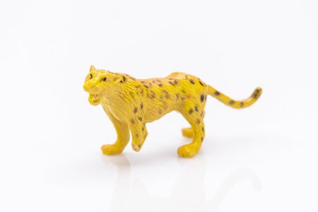 close up of a plastic panther toy isolated on a white backgroundの写真素材