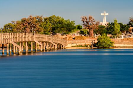 Wooden bridge to cross to Fadiouth cemeteryの写真素材