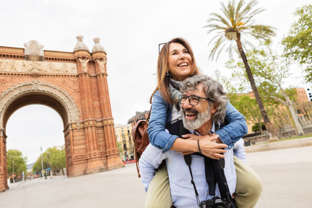 Senior couple in love having fun in Barcelona cityの写真素材