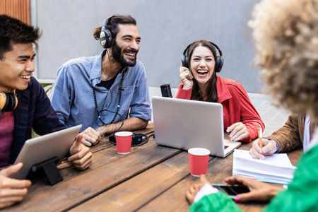 Millennial influencer friends having fun creating content on social platformの写真素材