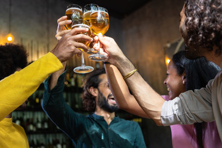 Young group of multiracial people toasting cold beer at happy hours brewery barの写真素材