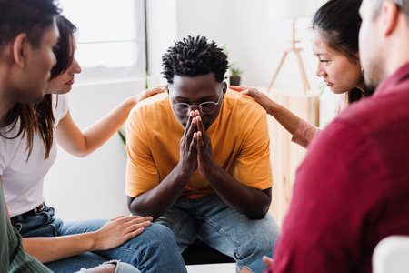 Group of people sitting in circle on therapy meetingの写真素材