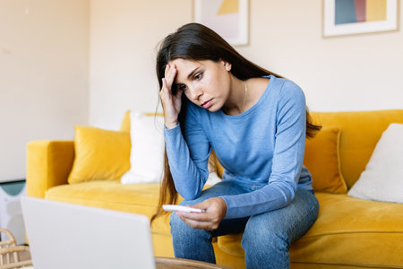 Sick woman having an online medical consultation with doctor at home