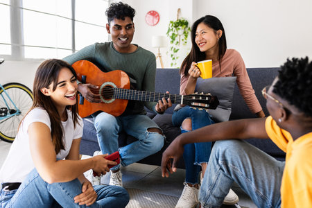 Young group of millennial friends having fun together at home