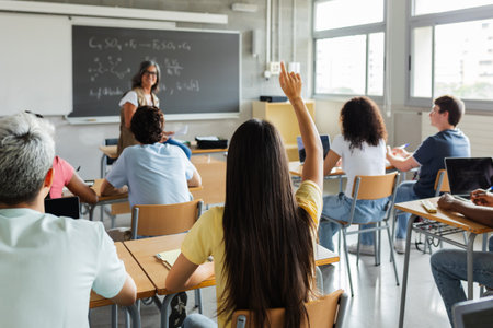 Young group of multiracial students attending teacher in class at high school.の写真素材