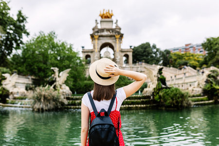 Young female tourist visiting Ciutadella Park in Barcelonaの写真素材