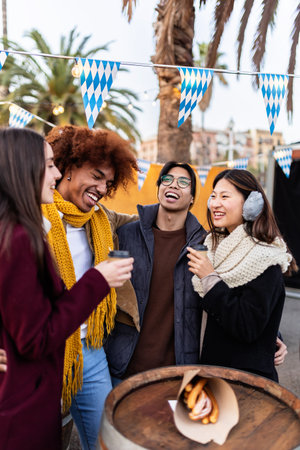 Multiracial young group of friends having fun together on winter holidaysの写真素材