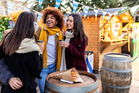 Multiracial young group of friends having fun together on winter holidaysの写真素材
