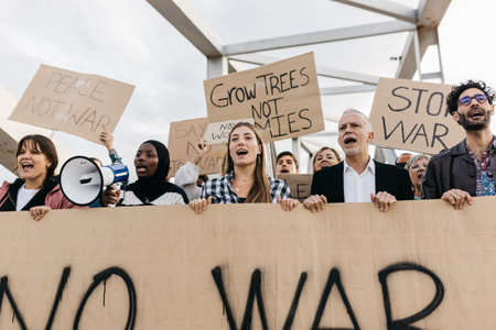 People protesting war and advocating peace on city bridgeの写真素材