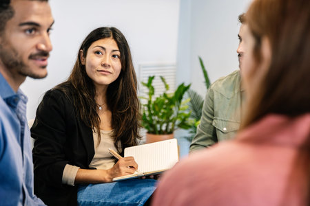 Diverse professionals collaborating during business meeting