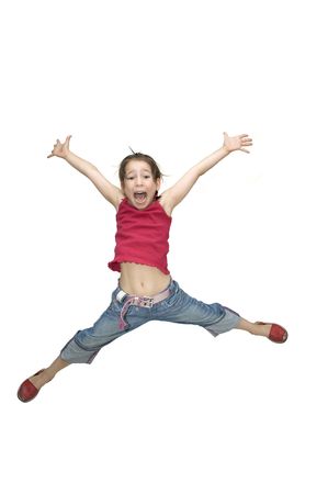 young girl jumping isolated on whiteの写真素材