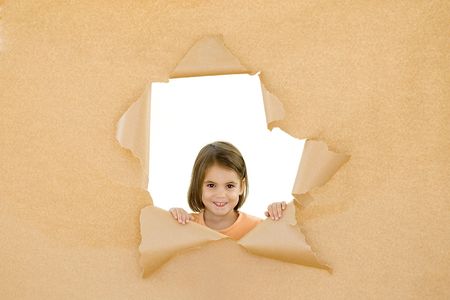 little girl breaking throughの写真素材