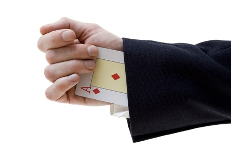businessman holding four aces 