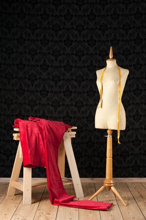 Tailor mannequin with tape measureの写真素材