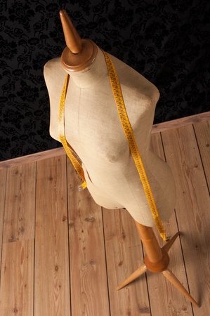 Tailor mannequin with tape measureの写真素材