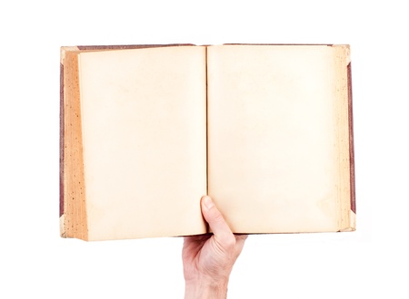 hand holding blank ancient book isolated on white backgroundの写真素材