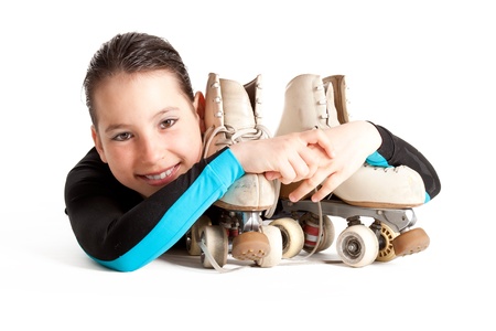 girl with roller skates isolated on white backgroundの写真素材
