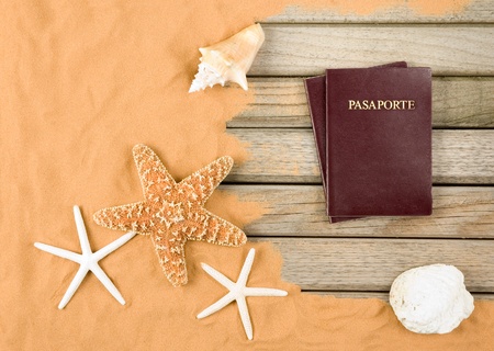 sand and wood background with passportの写真素材