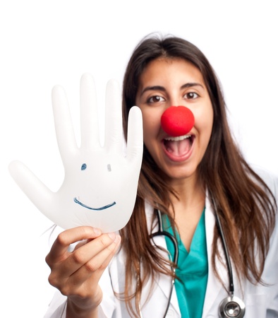 clown doctor having fun isolated on white backgroundの写真素材