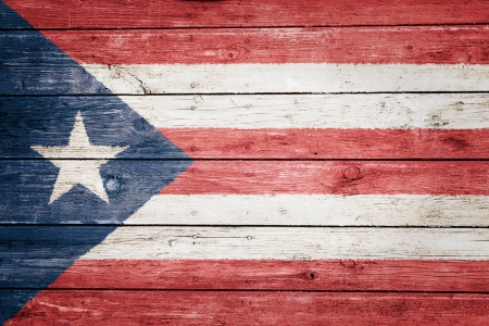 puerto rican flag on wood texture backgroundの写真素材