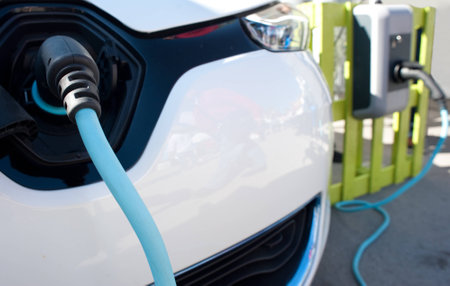 Close up of an electric car being chargedの写真素材