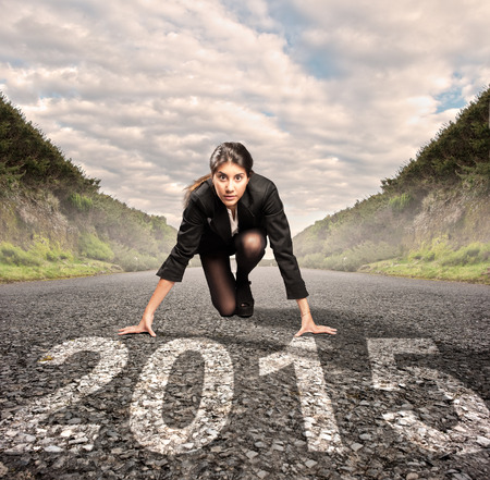 businesswoman on a road ready to runの写真素材