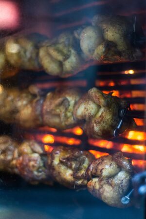 Spit-roast chicken Cooking 3 rows of chicken