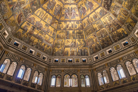 Representation of supernatural beings of different rank in a dome of a Catholic temple in Florence. A religious mosaic on a ceiling on a golden background.のeditorial素材