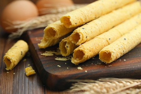 egg rolls on wood board