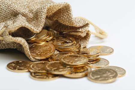 Golden RMB coins In cloth bagの写真素材