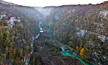 Plitvice lakes national park - early morning autumn view - canyon in fogの写真素材