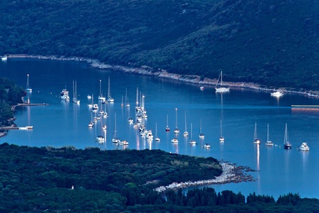 Island of Ilovik safe nautical harbor at dusk, Croatia