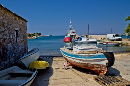 Small harbor in fishermen village of Kali, Island of Ugljan, Croatiaの写真素材
