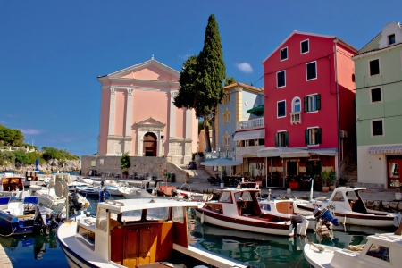 Veli Losinj harbor and colorful architecture, Island of Mali Losinj, Dalmatia, Croatiaの写真素材